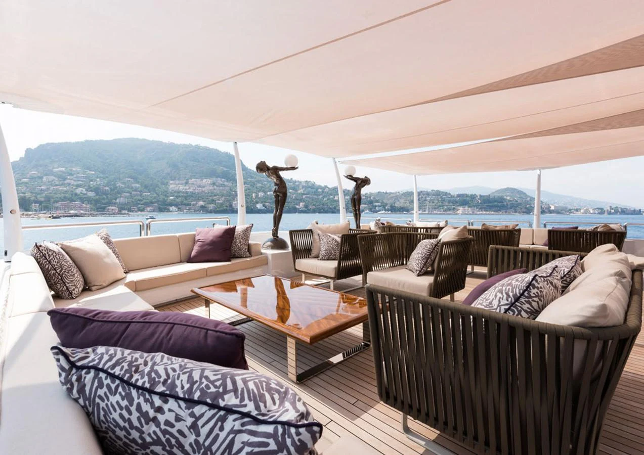 a living room with a large window aboard LADY A Yacht for Sale