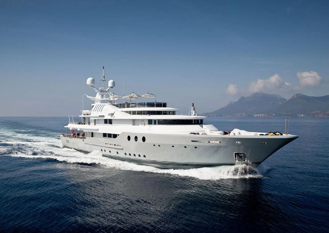 a white boat in the water aboard LADY A Yacht for Sale
