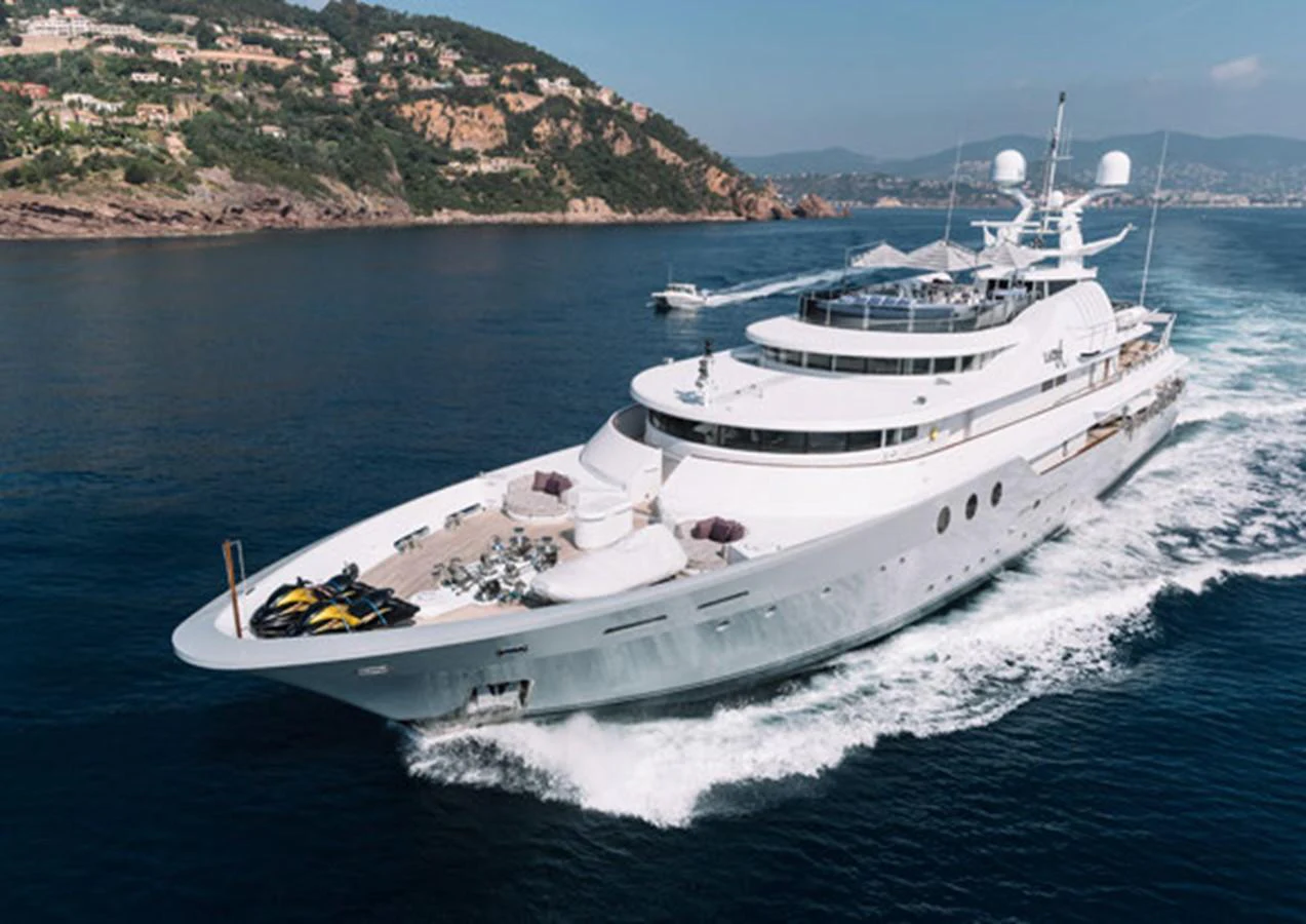 a white boat on the water aboard LADY A Yacht for Sale