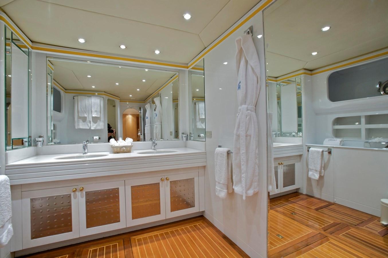 a bathroom with a shower curtain aboard ACHILLES Yacht for Sale