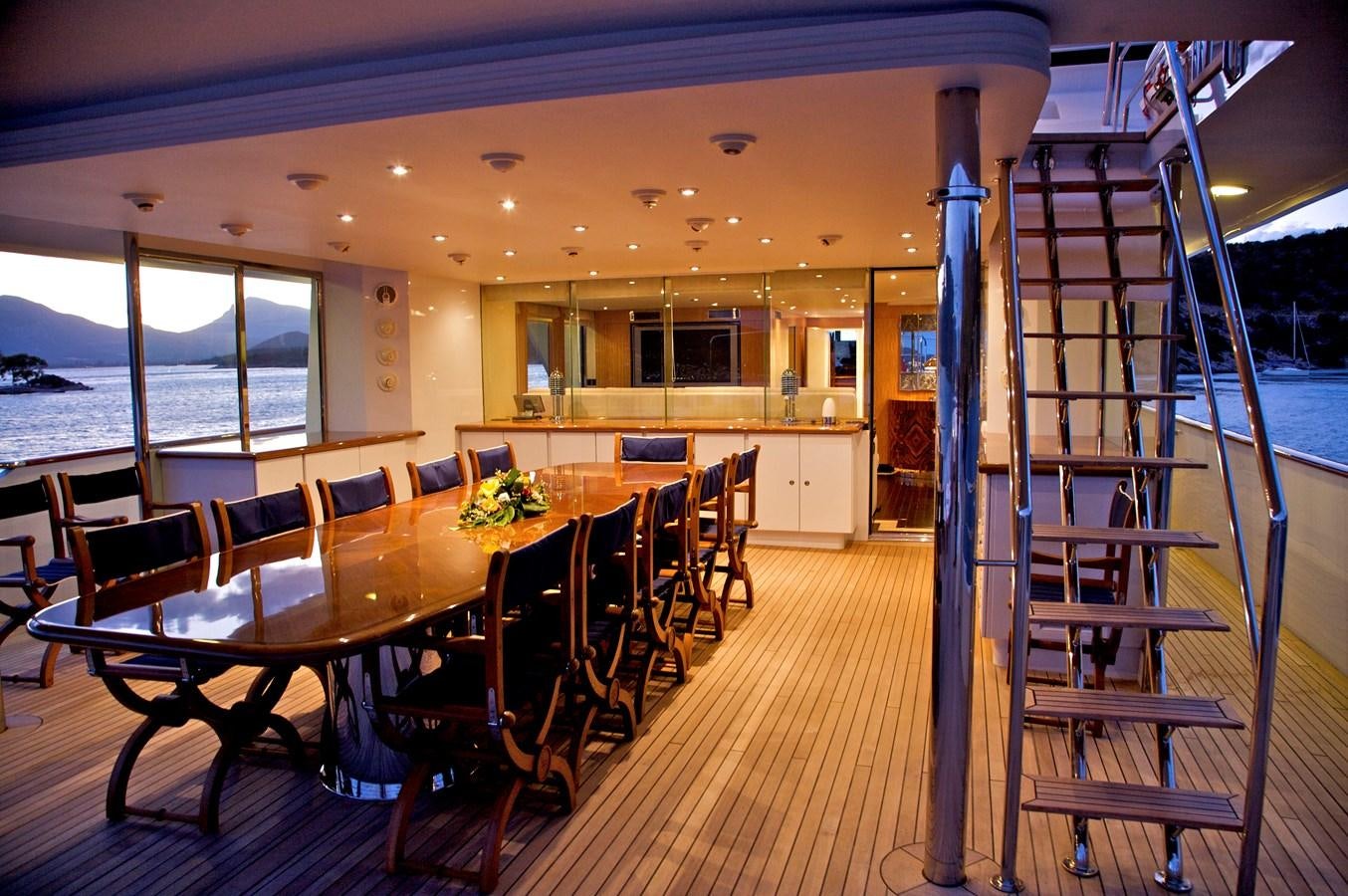 a large room with tables and chairs aboard ACHILLES Yacht for Sale