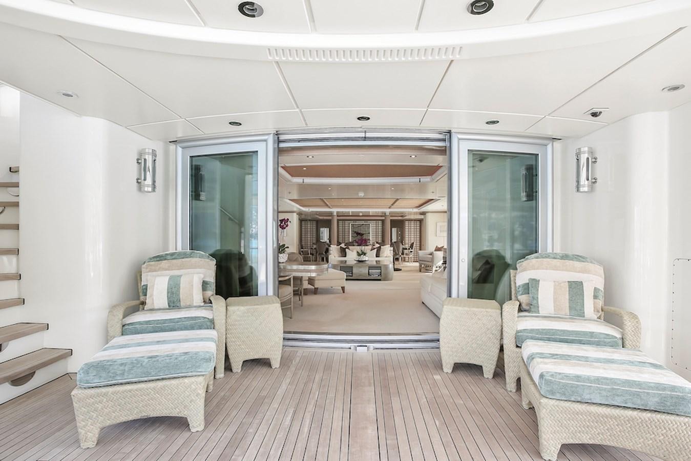 a living room with a wood floor aboard SAMIRA Yacht for Sale
