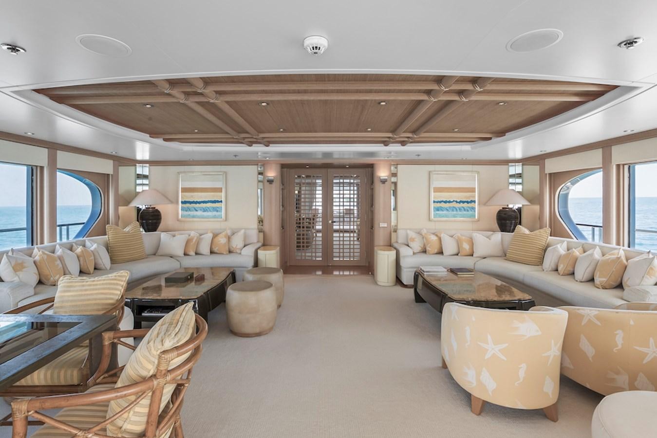 a living room with a large open door aboard SAMIRA Yacht for Sale