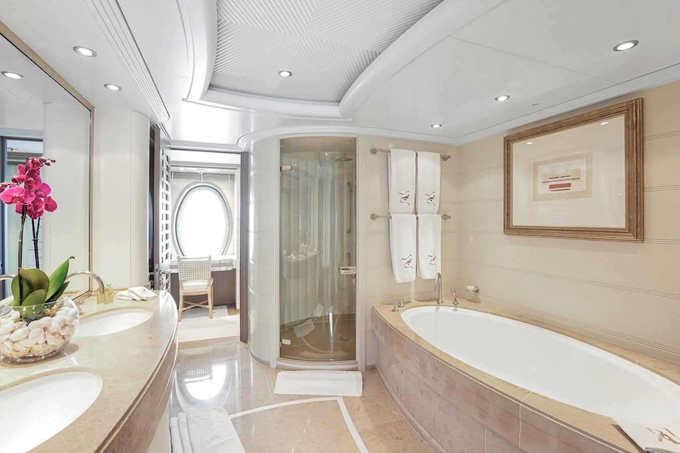 a bathroom with a bathtub and sink aboard SAMIRA Yacht for Sale
