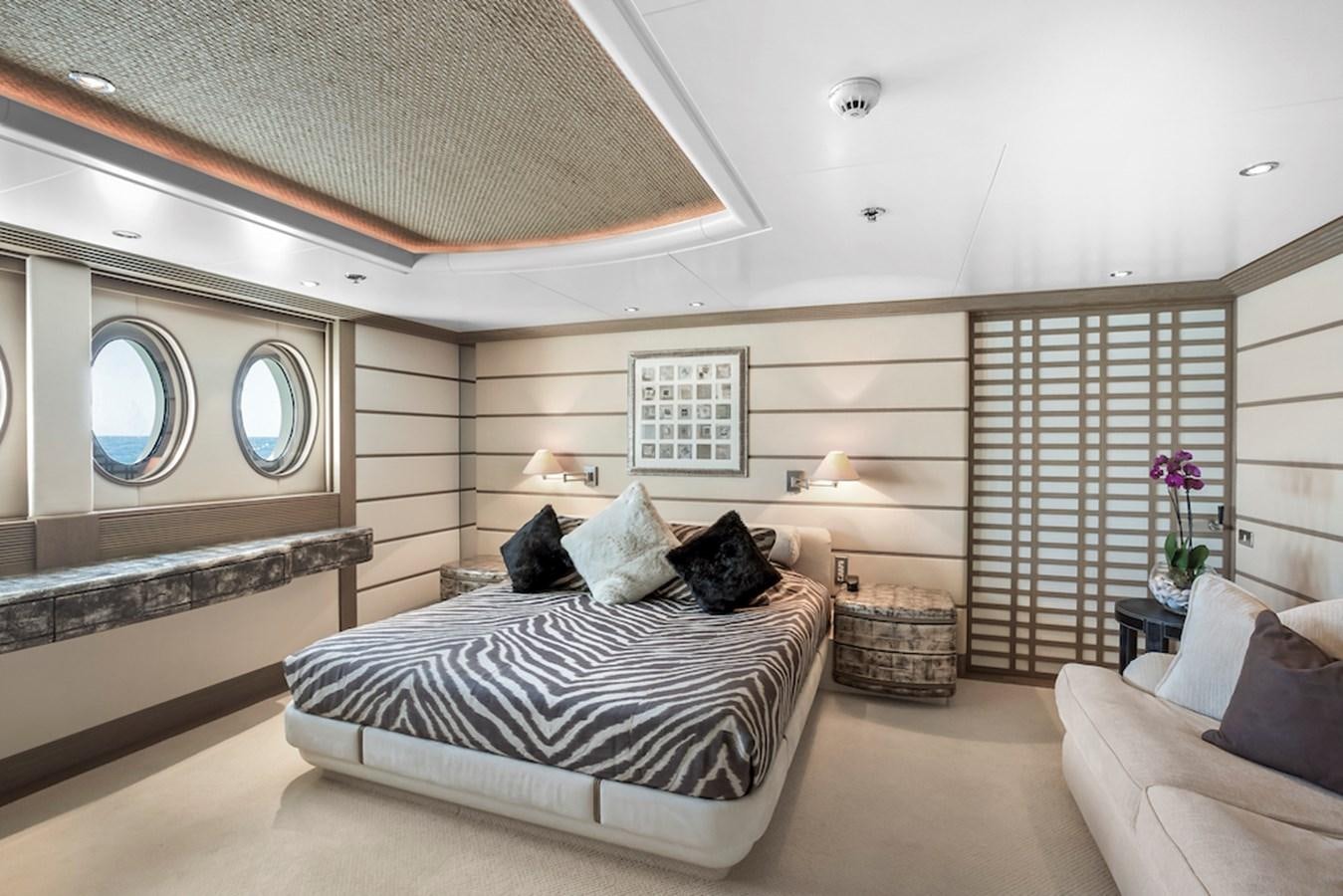 a large bedroom with a large bed aboard SAMIRA Yacht for Sale
