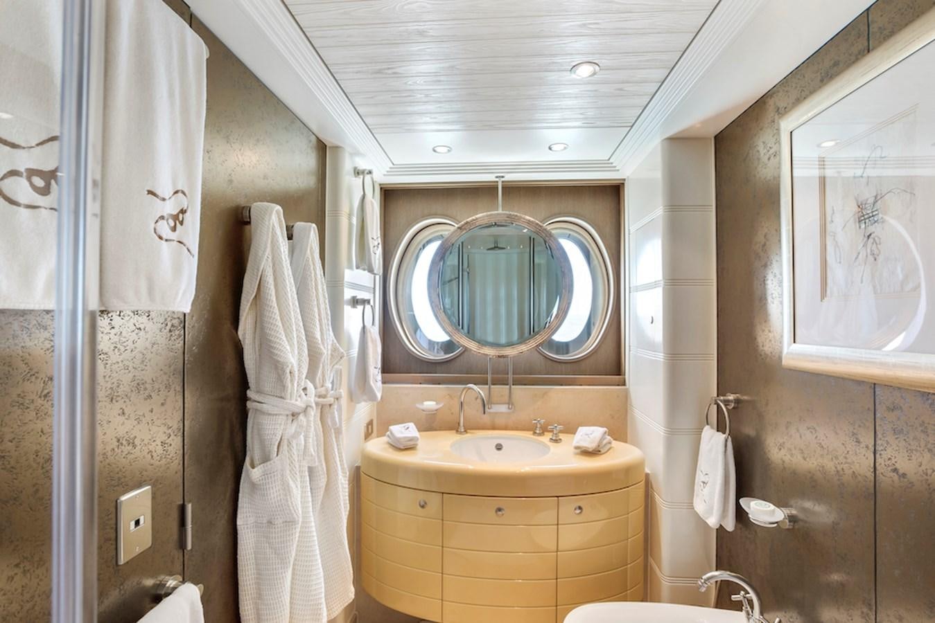 a bathroom with a large mirror aboard SAMIRA Yacht for Sale