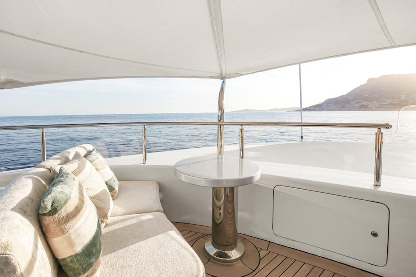a table with a pillow on it aboard SAMIRA Yacht for Sale
