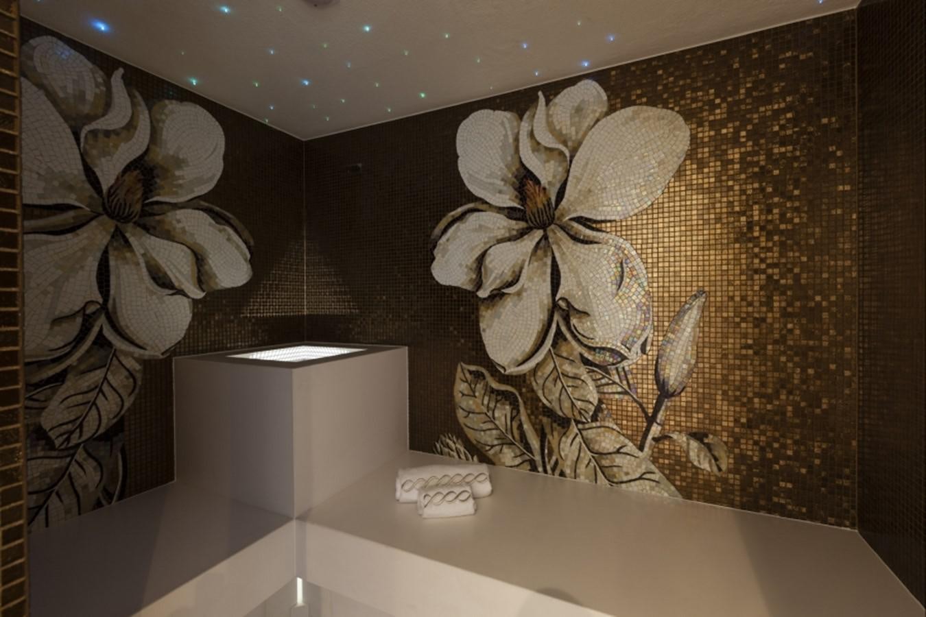 a display case with flowers aboard QUINTA ESSENTIA Yacht for Sale