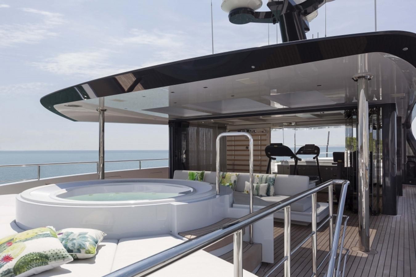 a large white swimming pool aboard QUINTA ESSENTIA Yacht for Sale
