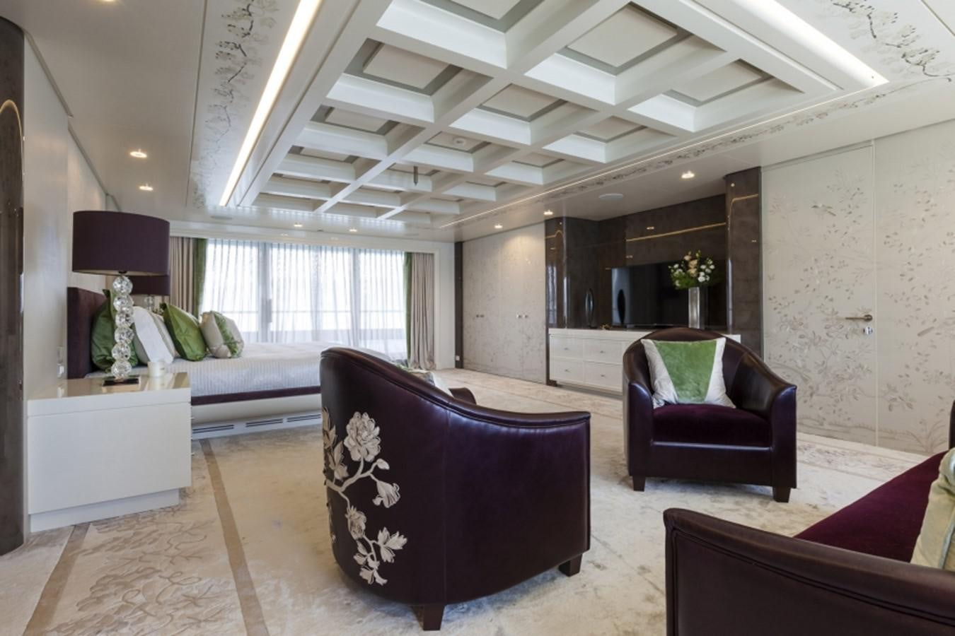 a living room with a couch and a chair aboard QUINTA ESSENTIA Yacht for Sale