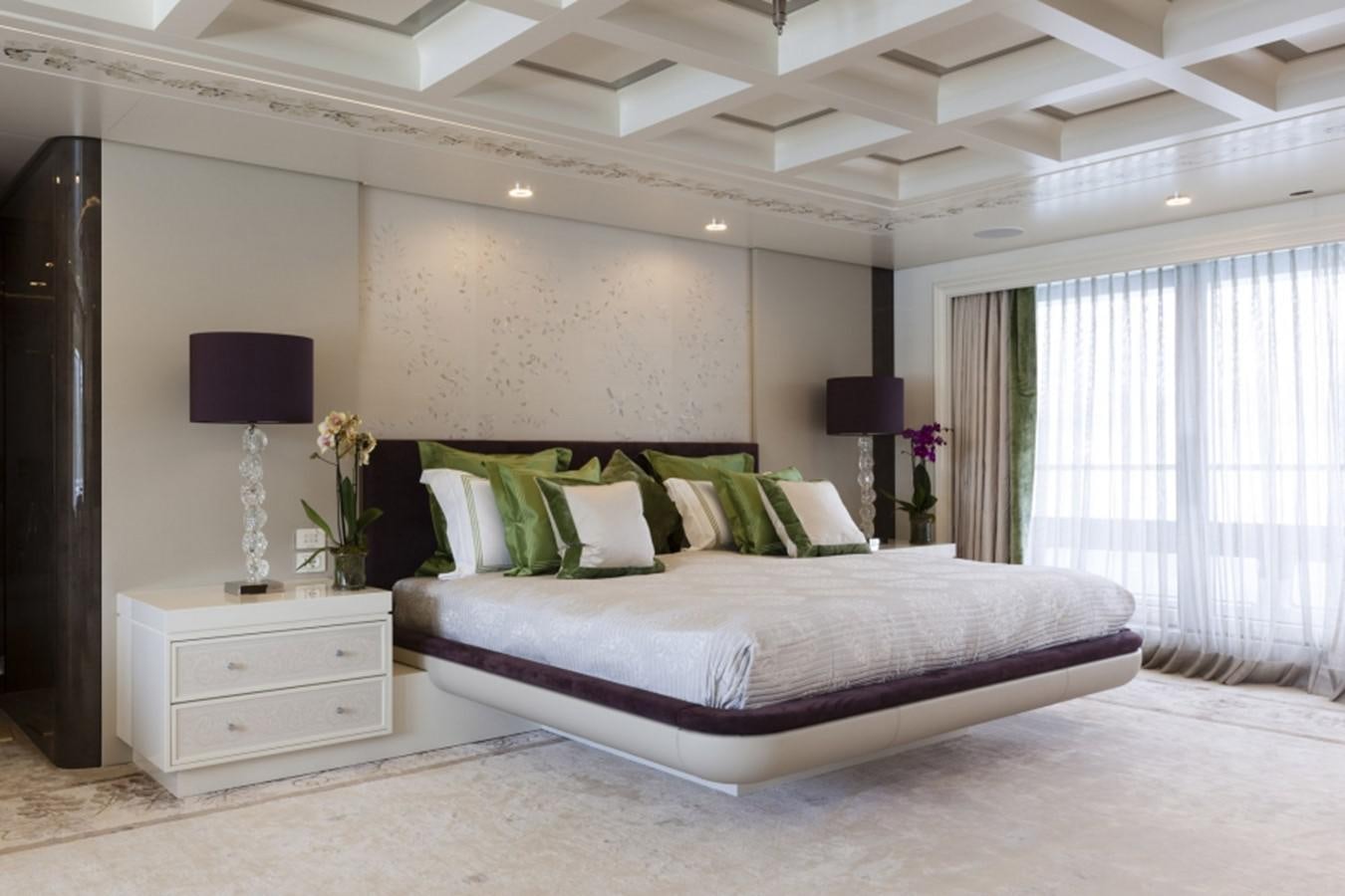 a large bed in a room aboard QUINTA ESSENTIA Yacht for Sale