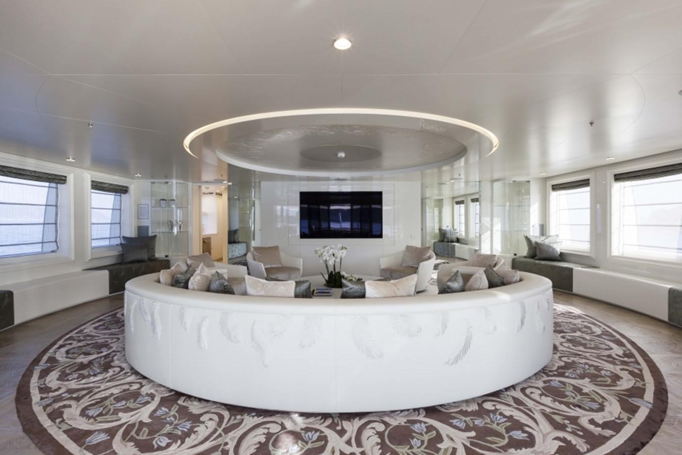 a large white bed in a large room aboard QUINTA ESSENTIA Yacht for Sale