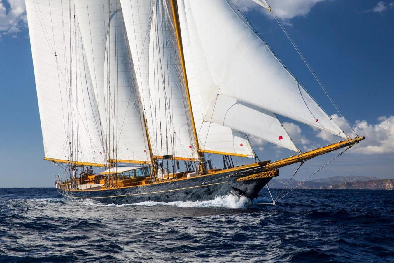a sailboat on the water aboard SHENANDOAH OF SARK Yacht for Charter