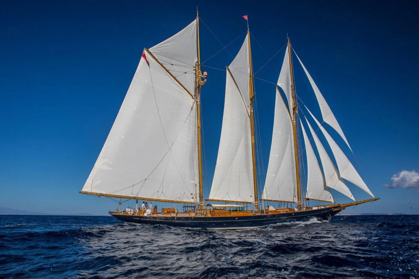 a sailboat on the water aboard SHENANDOAH OF SARK Yacht for Charter
