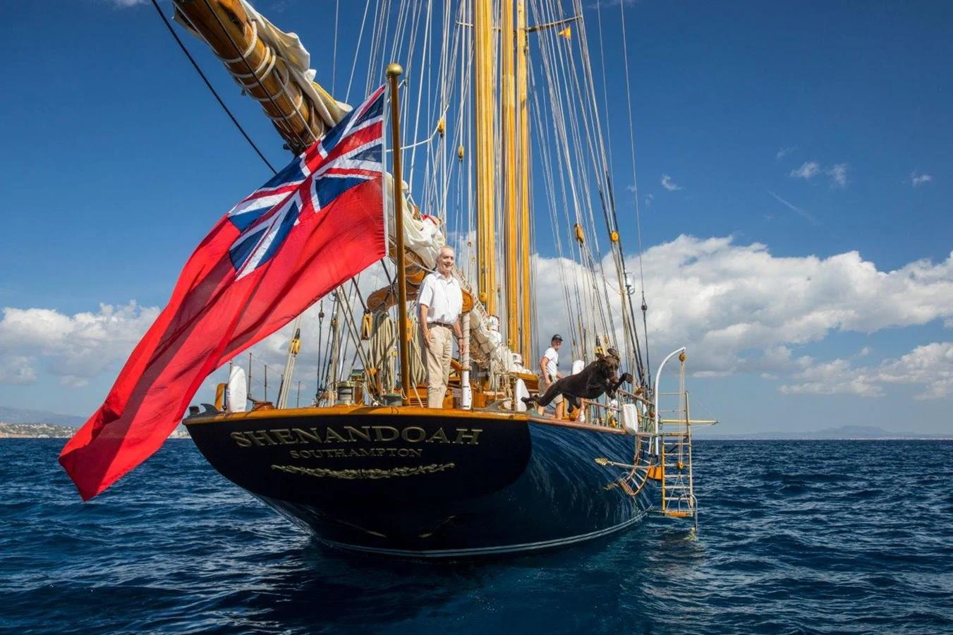 a group of men on a sailboat aboard SHENANDOAH OF SARK Yacht for Charter