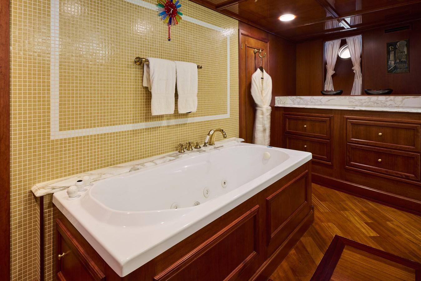a bathroom with a large white bathtub aboard SEAGULL II Yacht for Sale