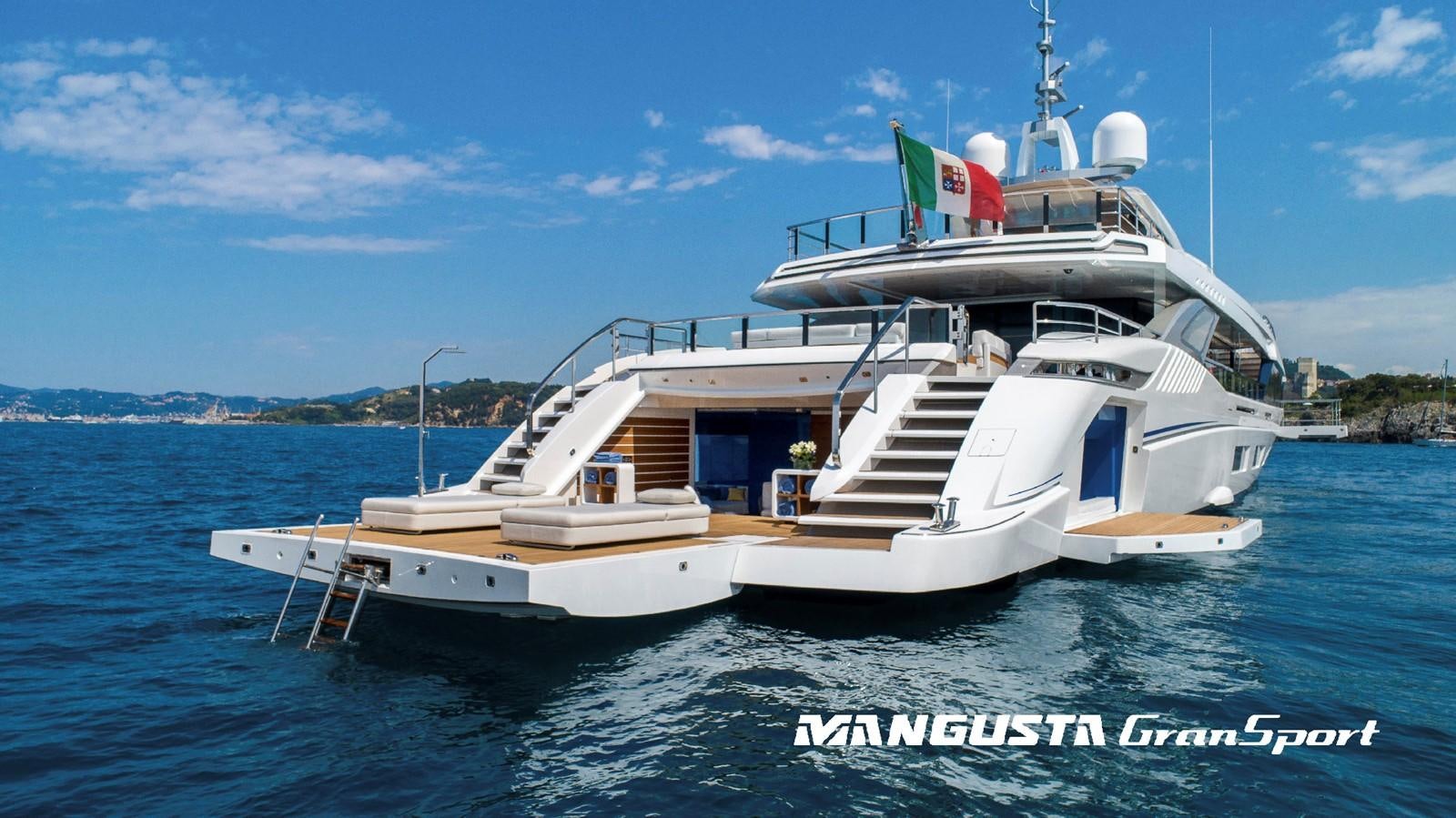 a large white boat in the water aboard MANGUSTA 165REV/04 Yacht for Sale