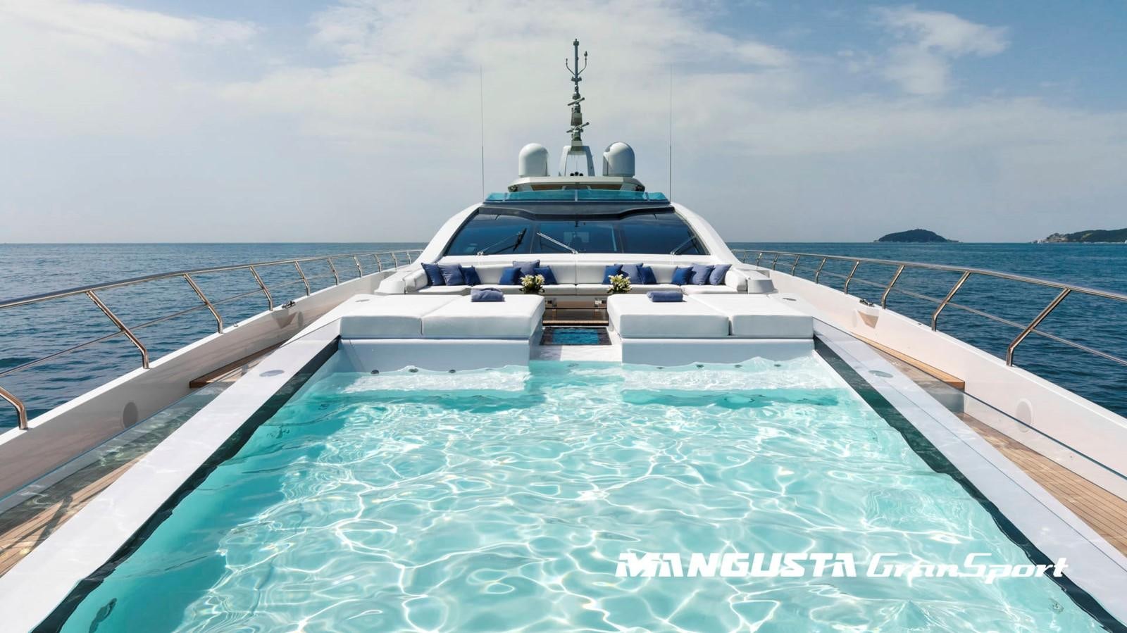 a boat on a body of water aboard MANGUSTA 165REV/04 Yacht for Sale