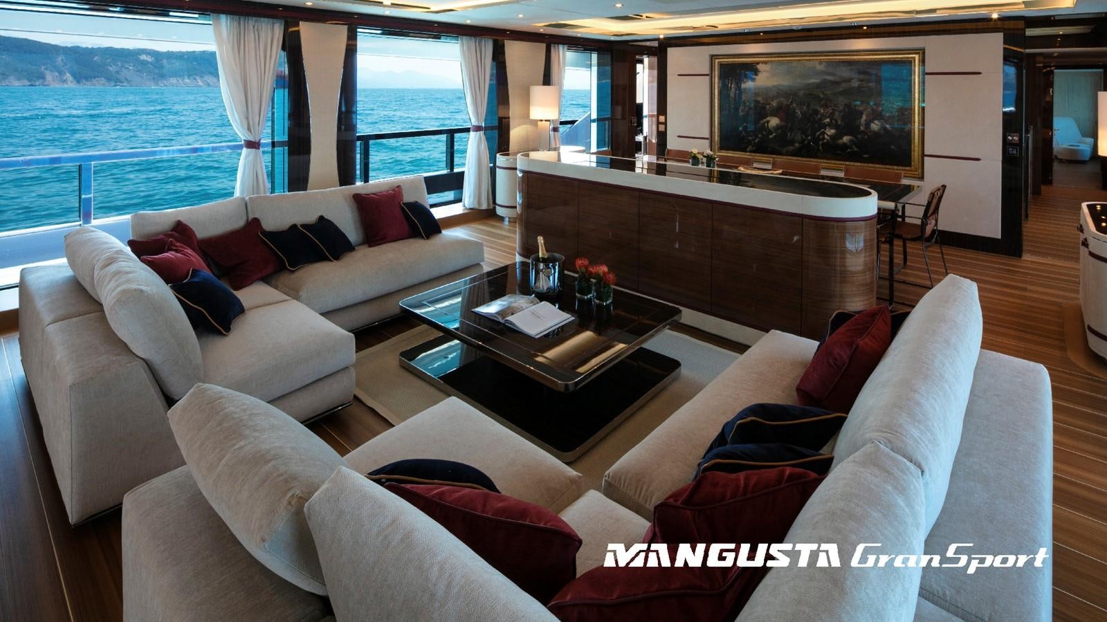 a living room with a large screen aboard MANGUSTA 165REV/04 Yacht for Sale