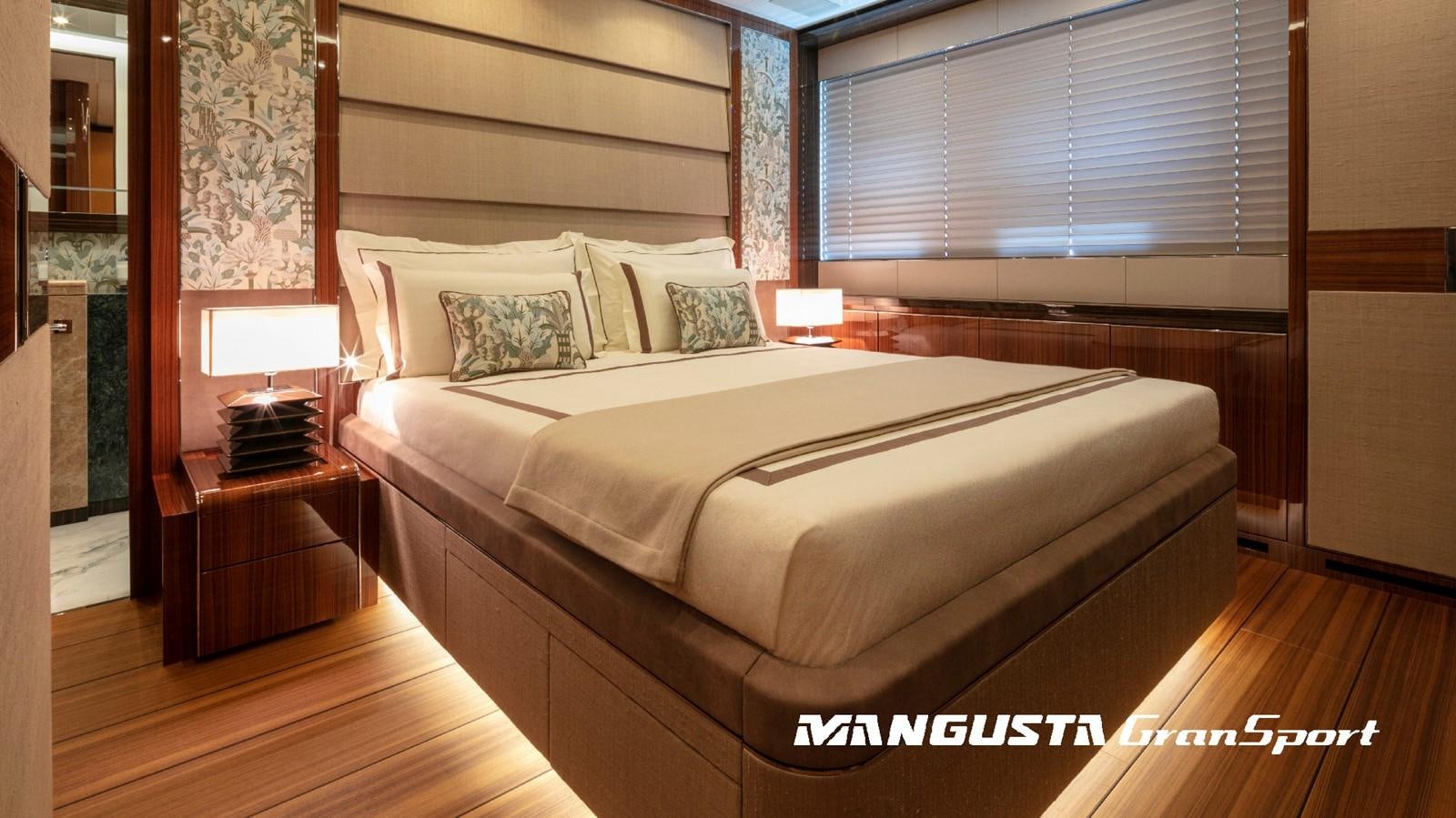 a bed in a room aboard MANGUSTA 165REV/04 Yacht for Sale