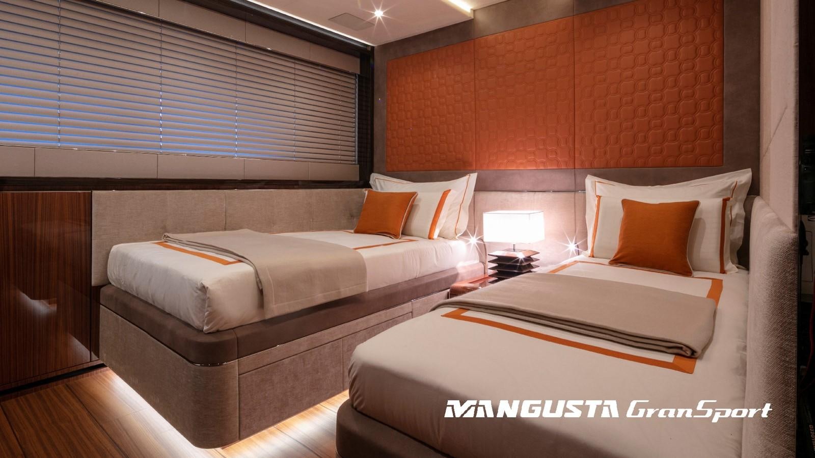 a room with two beds aboard MANGUSTA 165REV/04 Yacht for Sale