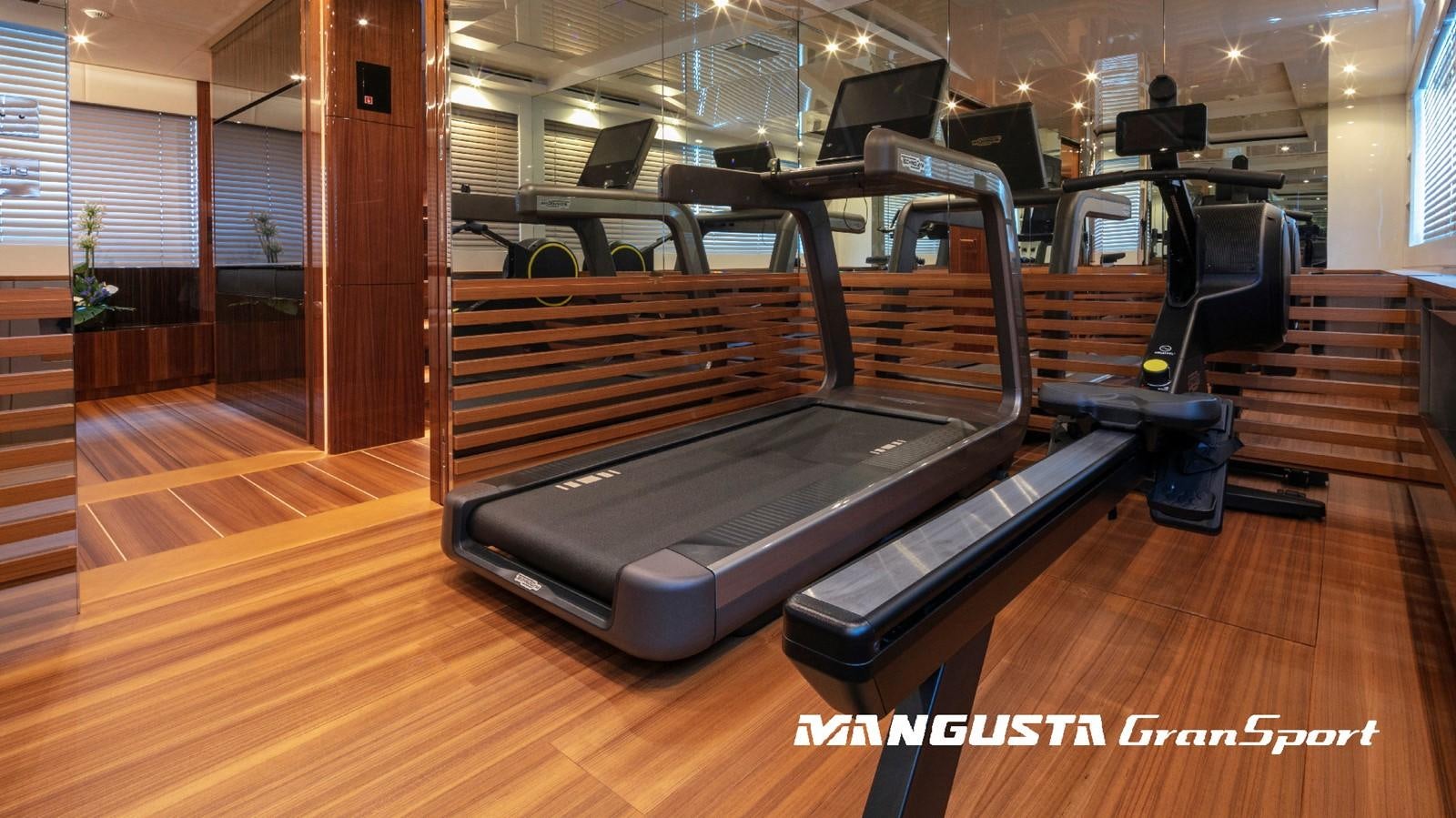a large gym with a bench aboard MANGUSTA 165REV/04 Yacht for Sale