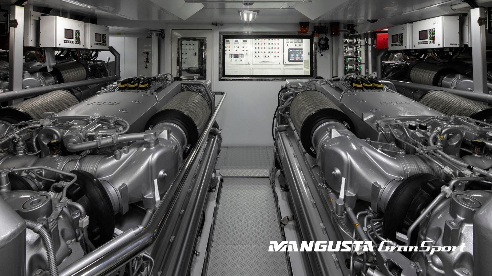 a car in a garage aboard MANGUSTA 165REV/04 Yacht for Sale