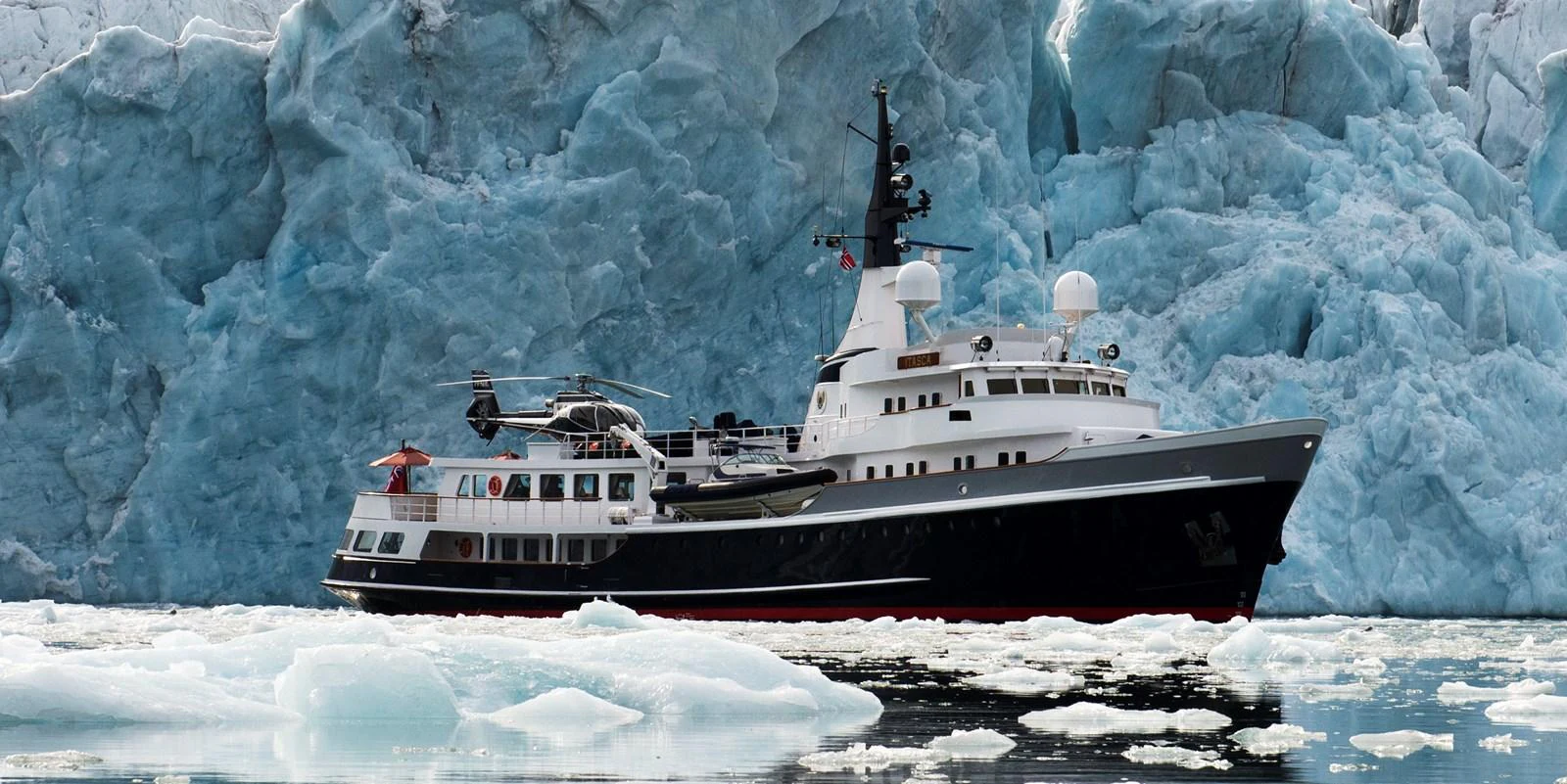 a boat in the water aboard ITASCA Yacht for Sale