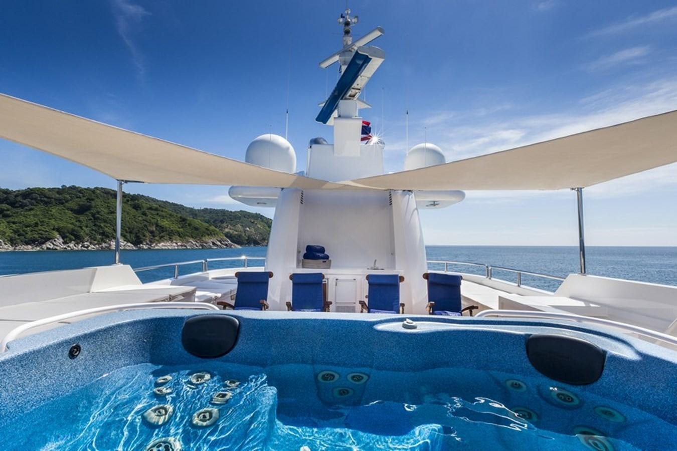 a pool with a satellite dish on the roof aboard NORTHERN SUN Yacht for Sale