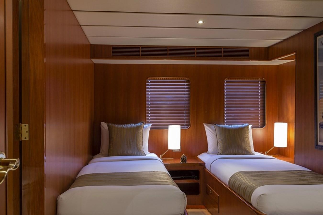 a room with two beds aboard NORTHERN SUN Yacht for Sale