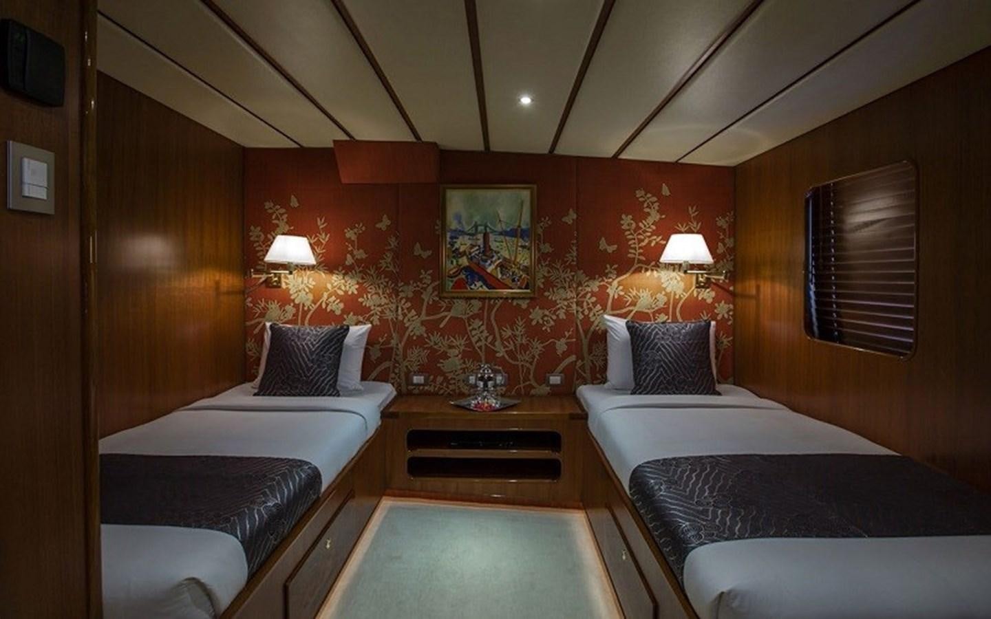 a room with two beds aboard NORTHERN SUN Yacht for Sale