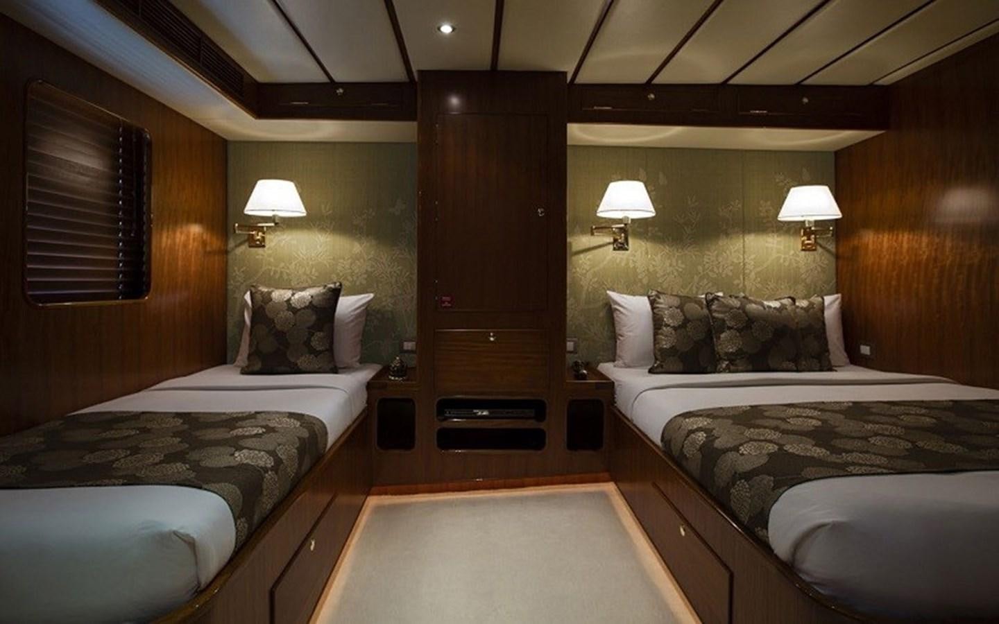 a room with two beds aboard NORTHERN SUN Yacht for Sale