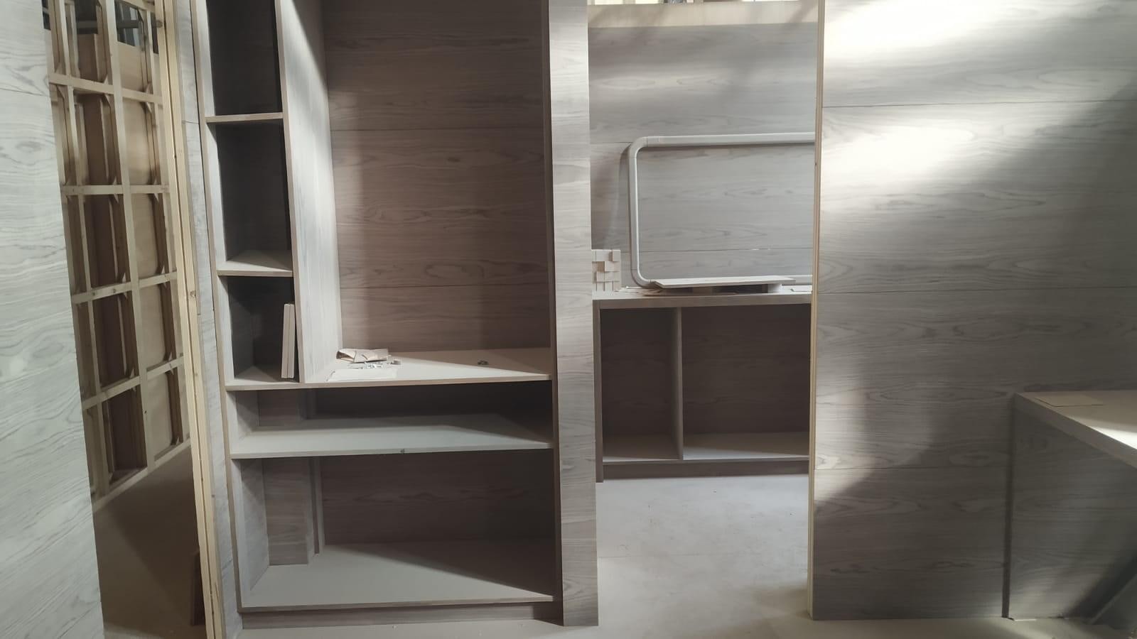 a room with a cabinet and shelves aboard MITI K Yacht for Sale