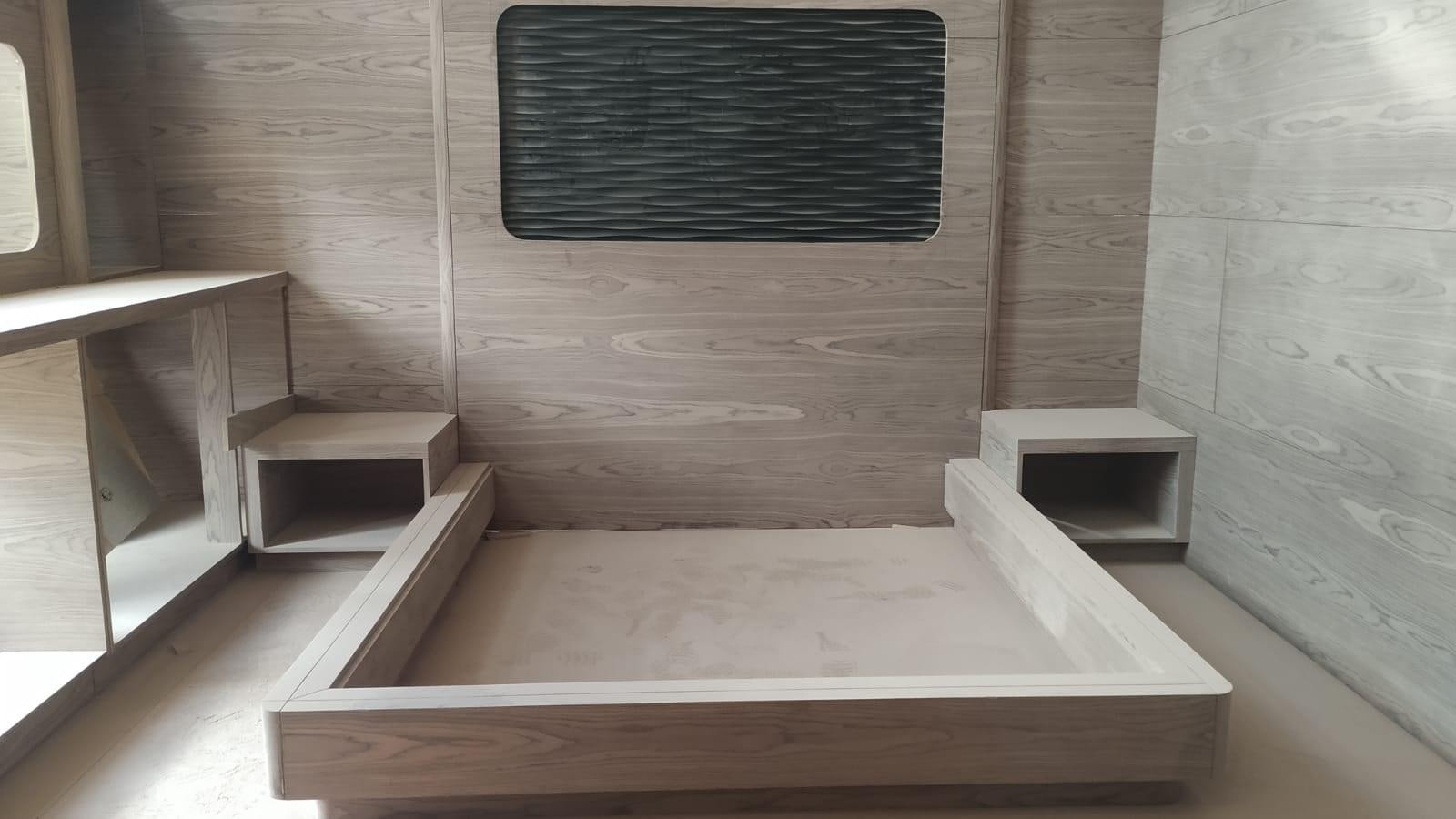 a wooden staircase in a building aboard MITI K Yacht for Sale