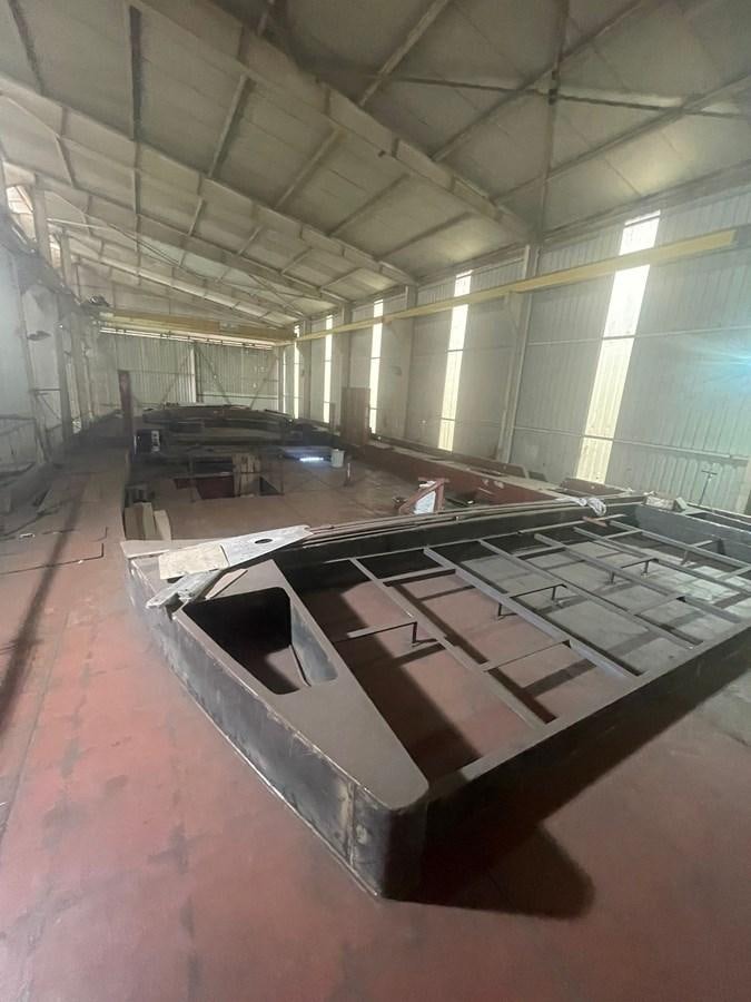 a large room with a large piano aboard MITI K Yacht for Sale