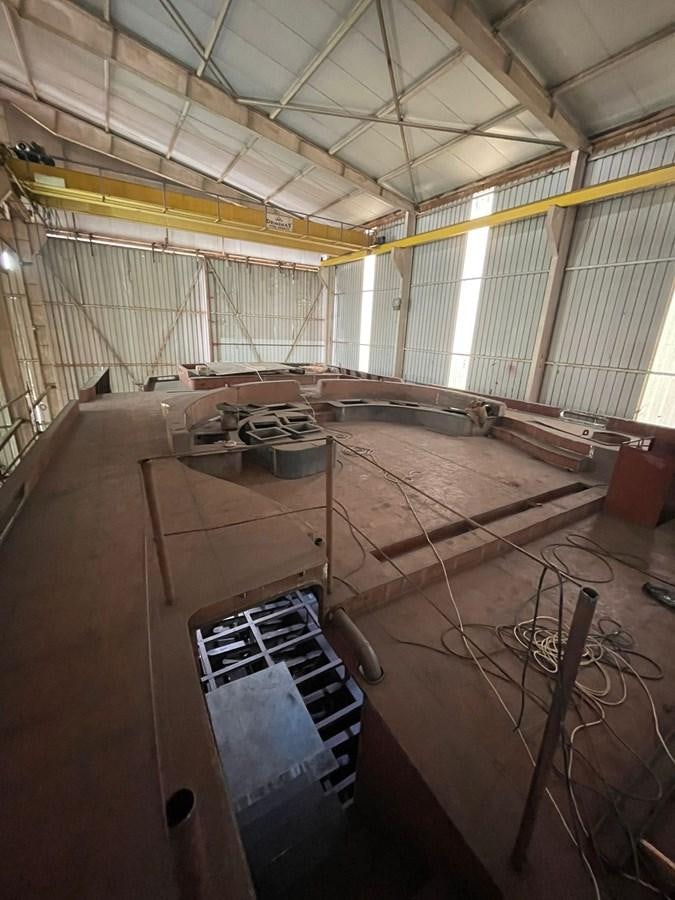 a large room with a large table and chairs aboard MITI K Yacht for Sale