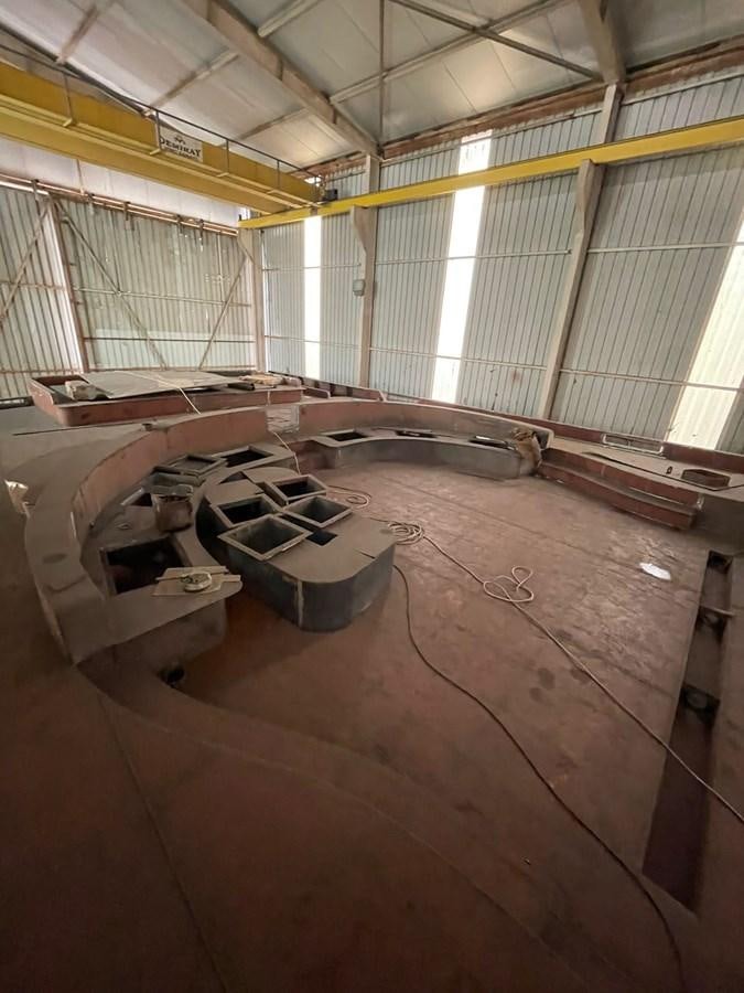 a room with a row of pipes and a large window aboard MITI K Yacht for Sale