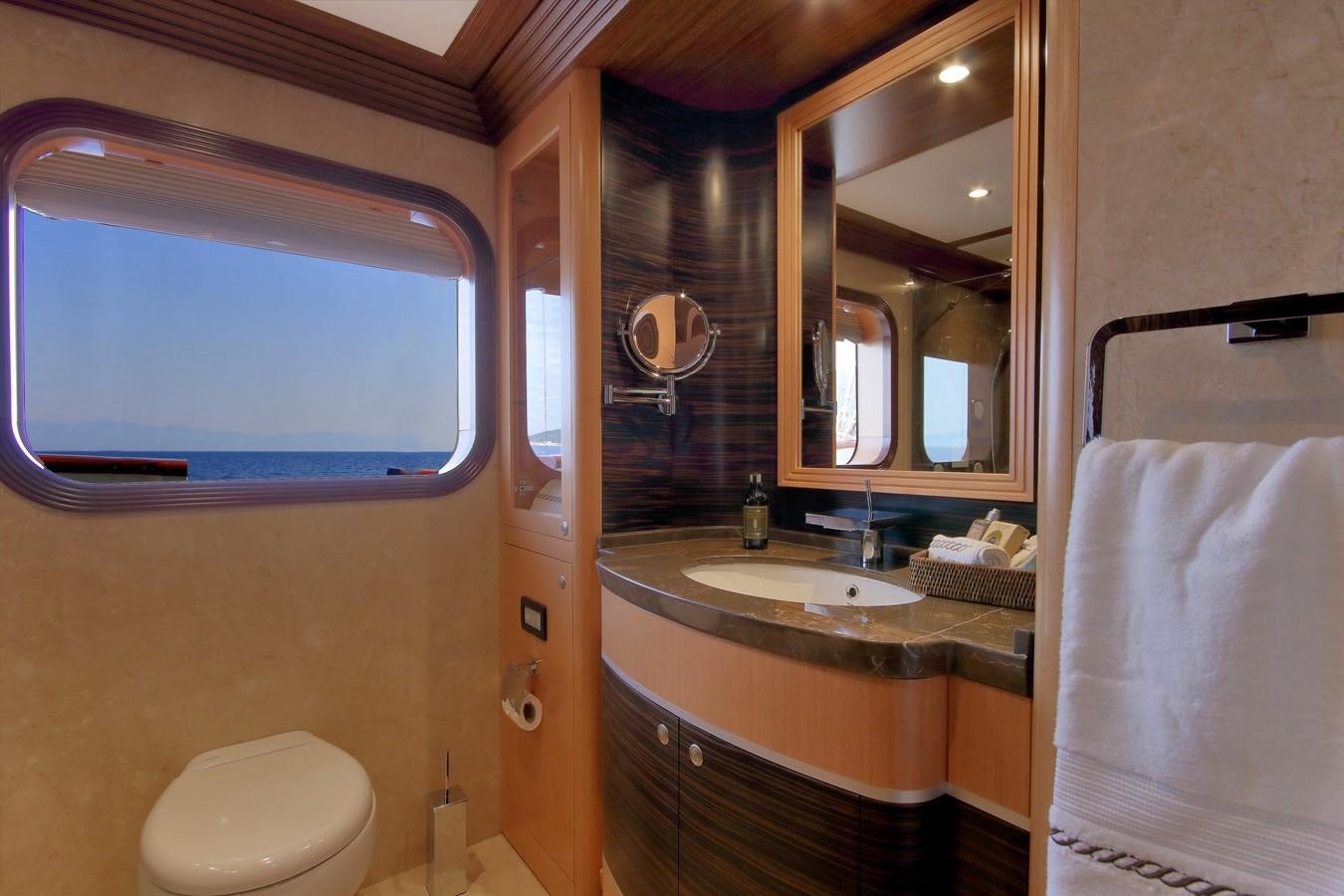 a bathroom with a sink and a mirror aboard MEIRA Yacht for Sale