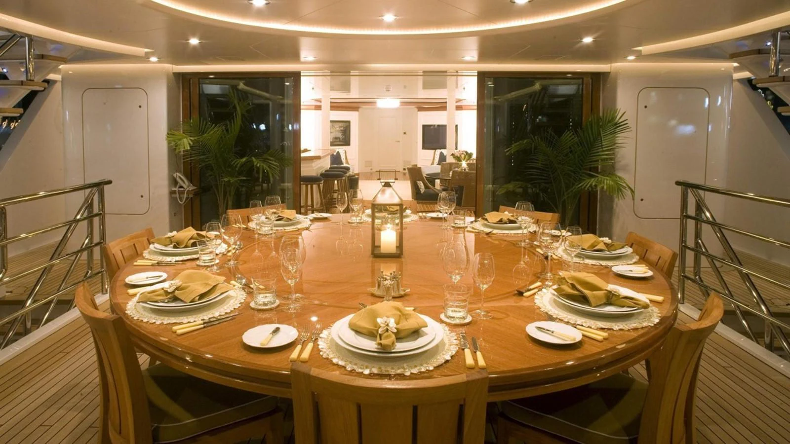 a table set for a dinner party aboard HADIA Yacht for Sale