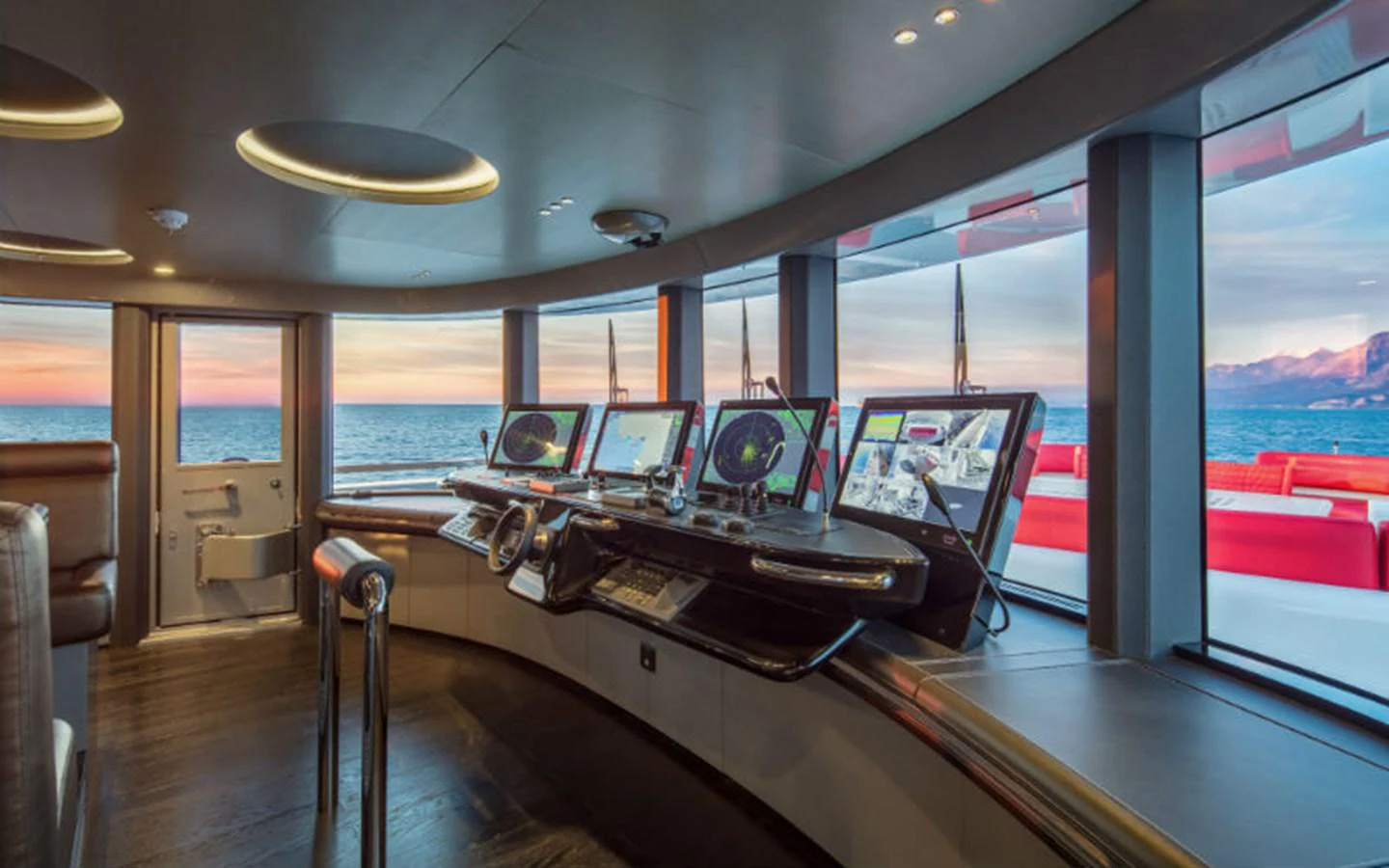a room with a table and chairs aboard EUPHORIA Yacht for Sale