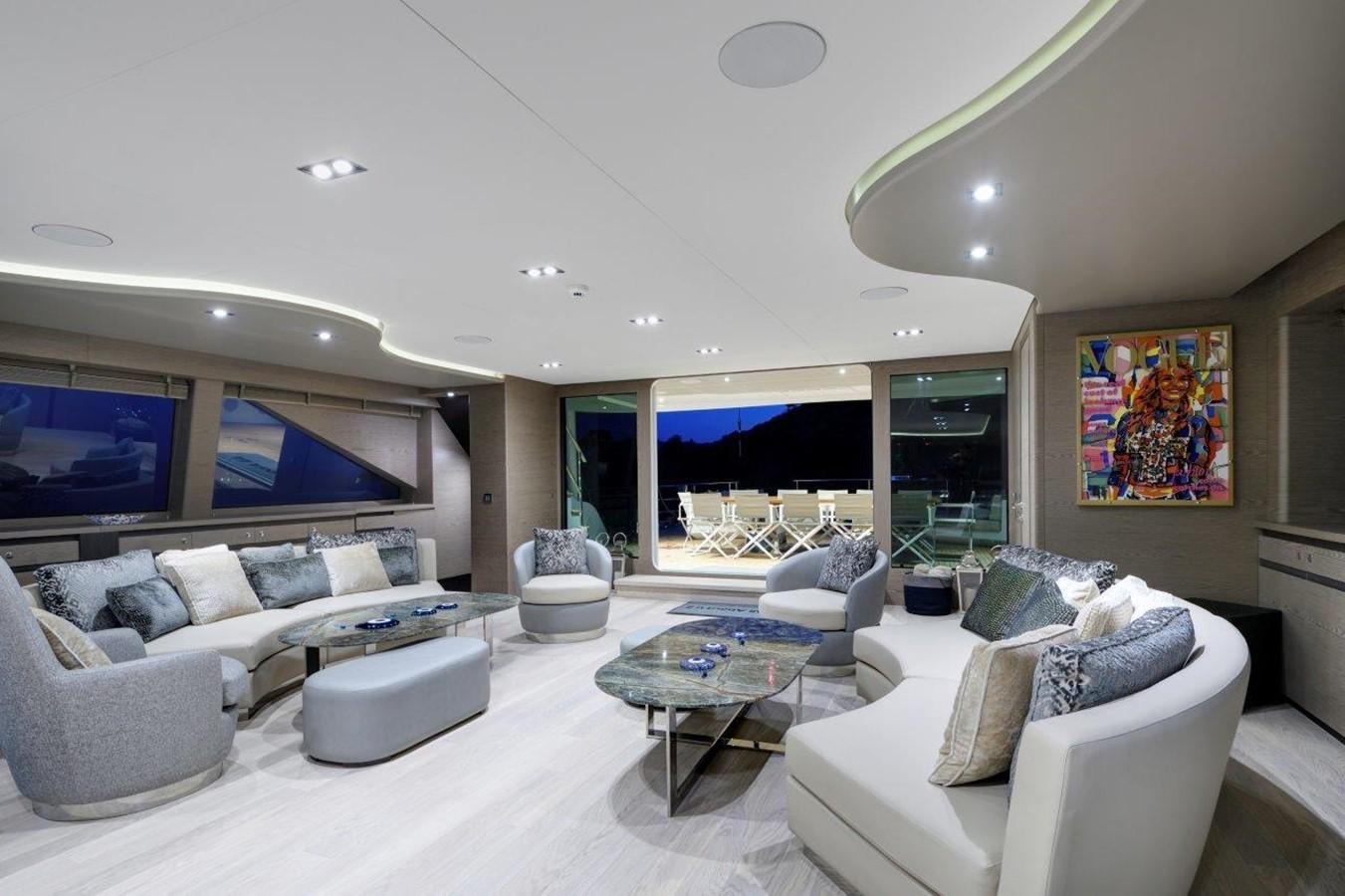 a living room with a large window aboard ALL ABOUT U 2 Yacht for Sale