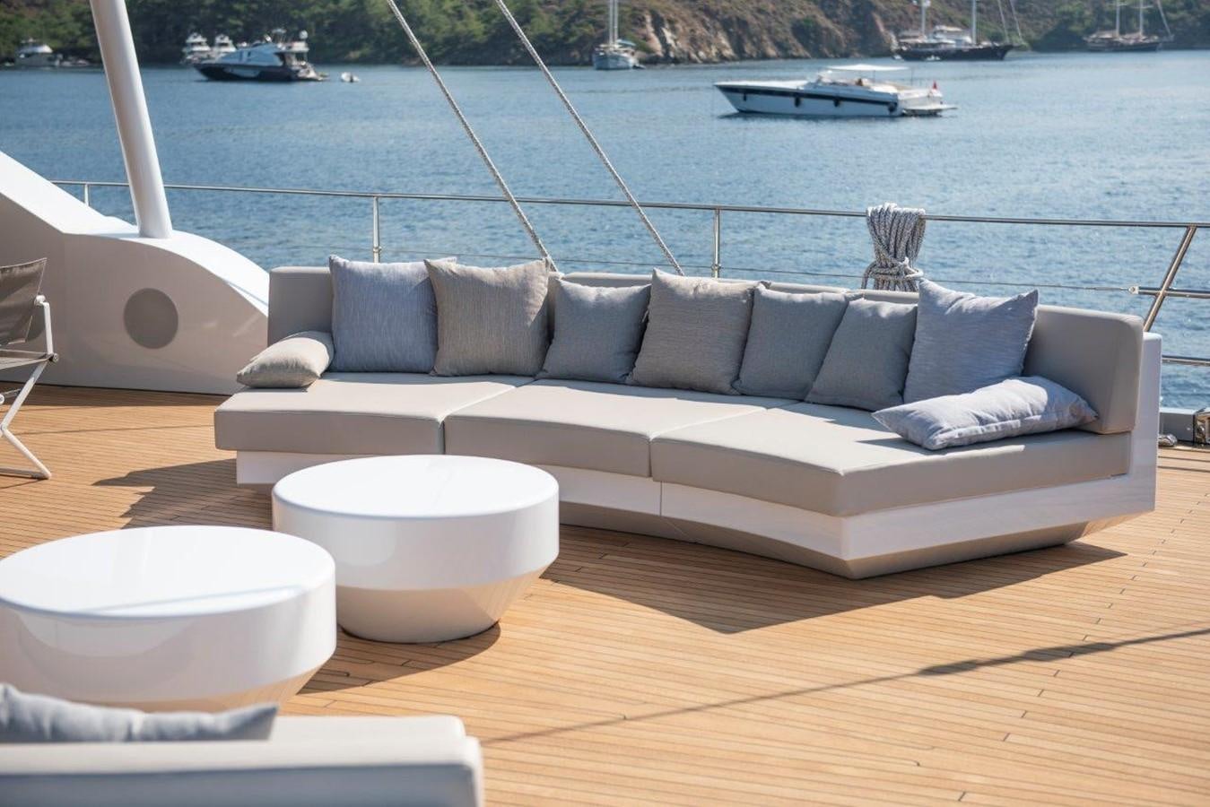 a couch on a deck aboard ALL ABOUT U 2 Yacht for Sale