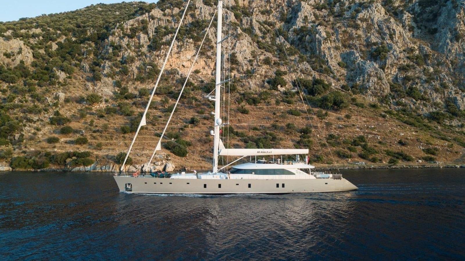 a boat sailing on the water aboard ALL ABOUT U 2 Yacht for Sale