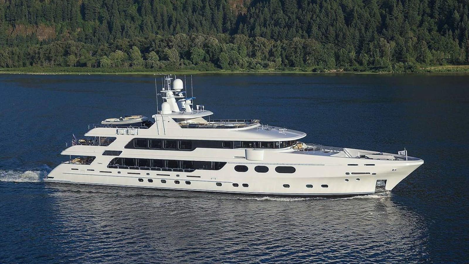 a white yacht on the water aboard JACKPOT Yacht for Sale