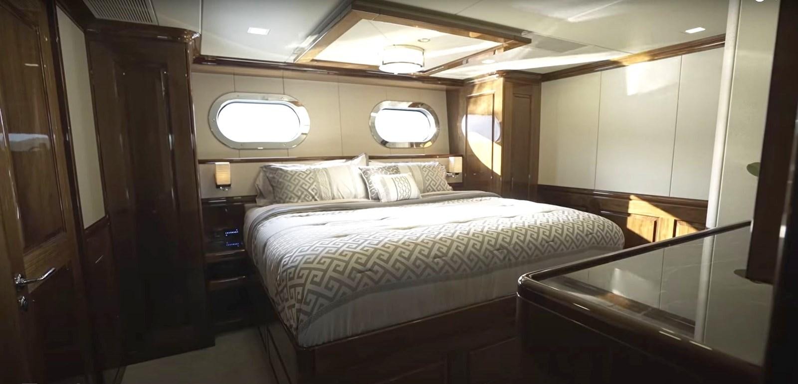 a bed in a room aboard JACKPOT Yacht for Sale