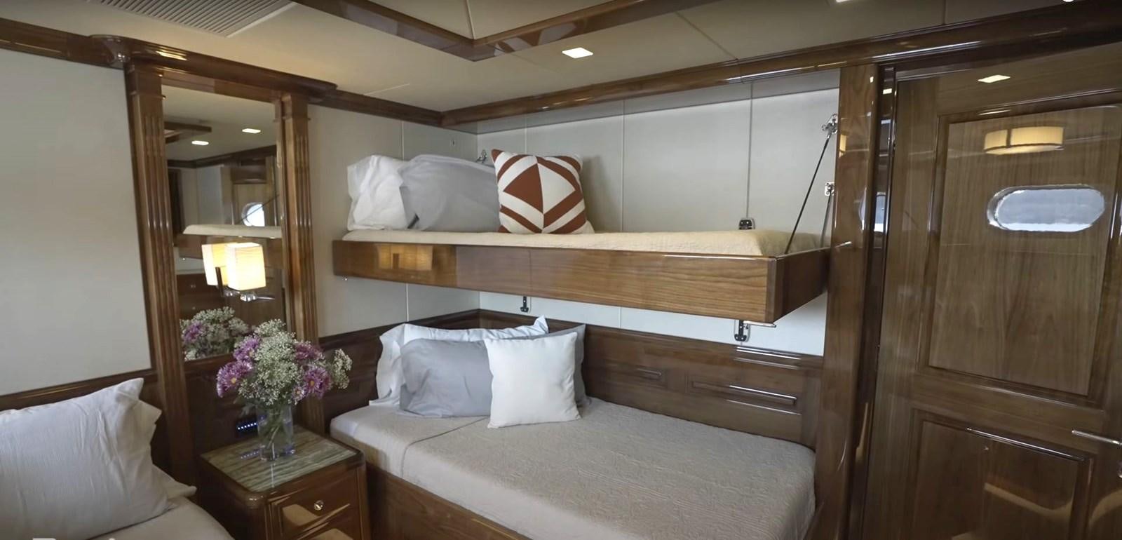 a bed in a room aboard JACKPOT Yacht for Sale