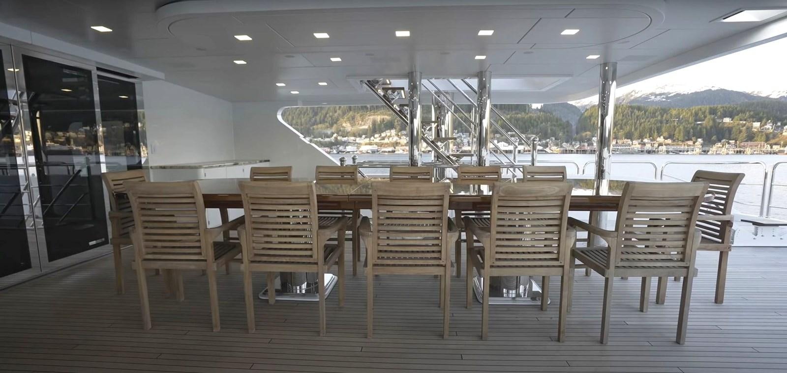a group of chairs in a room aboard JACKPOT Yacht for Sale
