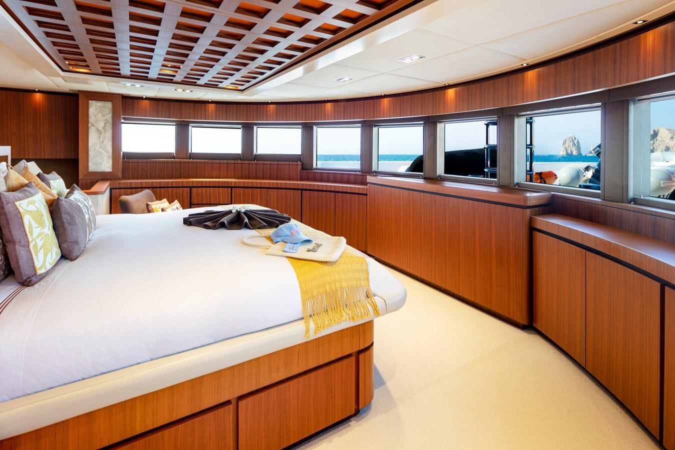 a bed in a room aboard CHAMPAGNE SEAS Yacht for Charter