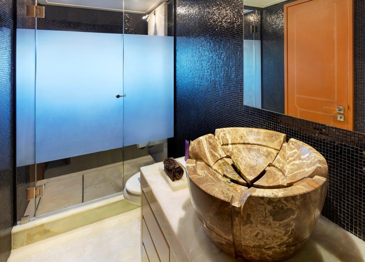 a large basket on a toilet aboard CHAMPAGNE SEAS Yacht for Charter