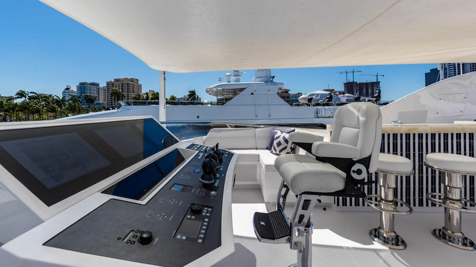 a room with a large window and a view of the water aboard APRICITY Yacht for Sale